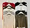 2026 Estilo Coreano Nuevo Regular Estilo Chino Estilo Botón Boutique Copo de Nieve Fino Otoño/Invierno Nueva Camiseta Base para Mujer