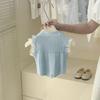 Conjunto de dos piezas de ropa para el hogar color crema, nuevo estilo 2025, para niños, con lazo de punto, chaleco y top de algodón con flores.