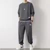 Novo conjunto de moletom em tricô waffle para homens, outono, camiseta de manga comprida cor sólida e calça comprida, esportivo e casual, atacado transfronteiriço
