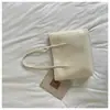 2026 Outono Inicial Nova Bolsa Tote de Mão com Textura Trançada Grande Capacidade Bolsa de Ombro Única Simples Retrô Bolsa Tote de Mão para o Trabalho