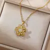 Collar para mujer estilo japonés y coreano transfronterizo copo de nieve mismo estilo micro-incrustado flor circonita conjunto giratorio traje collar de acero de titanio al por mayor