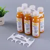 Directo del fabricante: nuevo asa de plástico para botellas de jugo y bebidas, juego de seis, al por mayor, con impresión de logotipo disponible