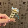 Nuevo peine para el cabello con borla de mariposa estilo chino, pasador elegante, peine con colgante exquisito, accesorio de estilo antiguo Hanfu cheongsam para mujer