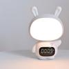 Lindo conejo de dibujos animados reloj de control remoto luz de noche de tres colores enchufable LED luz suave protección para los ojos temporizador luz de noche de enfermería