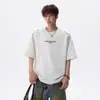 2026 Verano Bordado de Letras Diseño Casual Manga Corta Unisex Blanco Holgado Versátil Cuello Redondo Camiseta de Pareja Moderna