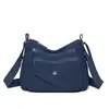 Bolso de mujer multicapa 2026 modelo nuevo de primavera gran capacidad tela de nailon bolso para mamá bolso cruzado para mediana edad bolso de hombro casual