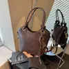 Bolsa Cruzada Retro Súper Caliente Transfronteriza Otoño 2026 Nueva Versátil de Hombro Cruzado para Mujer, Bolso de Cubo Casual de Mano