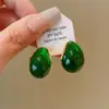 Pendientes de borla con carcasa de madera marrón transfronterizos europeos y americanos, pendientes de estilo vintage Maillard, pendientes de mujer de lujo ligero de alta gama