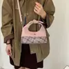 2026 Sensación Ligera Hombro Único Retro Nuevo Estilo Bolso de Mano Versátil con Bloques de Color para Mujer Bolso Cruzado de Nicho de Lujo Moda Otoño Invierno