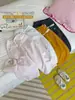 Calça de moletom feminina 2026 novo estilo outono, acabamento em renda, tecido macio e confortável, corte solto, respirável, não restritivo, calça esportiva versátil