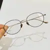 Gafas cat-eye cuadradas-redondas de titanio ultraligeras, ovaladas azules lisas bloqueadoras de luz azul, alambre dorado y plateado, se pueden adaptar con lentes recetados, montura de gafas Danyang para hombre