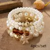 Moda Europea y Americana Transfronteriza Estilo Bohemio Colgante de Estrella de Mar Perla de Cristal Versátil Multicapa Temperamento Conjunto de Pulseras para Mujer