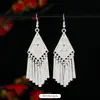 Aretes de Estilo Exótico de Venta Caliente Retro Literario Clásico Dignificado Ganchos para la Oreja Versátil Hueco Moda Borla Colgantes
