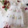 Vestido de Verano 2026 Nuevo sin Espalda con Alas Brillantes y Mariposas Bordadas, Vestido de Malla Estilo Coreano con Tirantes de Princesa para Niñas