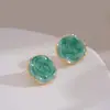 Pendientes de botón redondos de onda verde retro de alta calidad, pendientes de estilo francés con sentido de diseño, pendientes de nicho de temperamento suave
