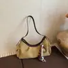 Bolsa Transfronteiriça de Camurça Feminina Grande Capacidade Nova Outono e Inverno 2025 Bolsa Transversal Fosca Retrô Bolsa Dumpling para o Trabalho