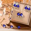 Pendientes de Aro con Colgante de Lazo Incrustado de Diamantes Europeos y Americanos Pulsera Juego de Tres Piezas Traje Banquete de Bodas Traje de Joyería Versátil