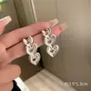 Pendientes de estilo antiguo europeo y americano Pendientes de estilo francés de lujo ligero de alta gama únicos Pendientes de diseño de nicho nuevo Pendientes retro para mujer