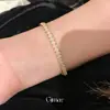Pulsera vintage estilo palacio con cierre de corazón de circonita chapada en oro real de 18 quilates, joyería de moda exquisita transfronteriza europea y americana