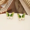 Brincos de borboleta de cristal verde com laço de mola, pino de prata 925, brincos degradê de gelo quebrado, brincos pop de nicho