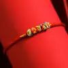 Pulseira de Corda Vermelha do Festival do Barco-Dragão Tecida à Mão Estilo Étnico Fivela de Flor de Ameixa Corda de Mão Fivela Colorida Pequena Joia Transportando Pequeno Presente
