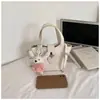Bolso de Cubo Fresco Estilo Coreano para Mujer 2026 Primavera Nuevo Bolso de Hombro Casual Elegante Bolso Cruzado de Moda para el Trabajo