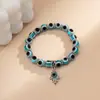 Pulsera de cuentas tejidas de mariposa y bergamota de estilo étnico transfronteriza europea y americana, pulsera de ojo turco de personalidad simple