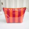 Bolsa de Maquillaje Impermeable de PVC de Nuevo Modelo Transfronteriza para Mujer, Neceser Rayado de Gran Capacidad, Bolsa de Almacenamiento de Viaje Versátil de Alto Valor
