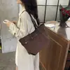 Bolso de mano nuevo estilo retro, gran capacidad, un bolso de hombro moderno y elegante con un diseño único, perfecto para mujeres a la moda