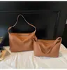 Bolsa Tote Casual Retrô Transfronteiriça Bolsa Feminina 2025 Nova Moda Superfície Macia Bolsa de Ombro para o Dia a Dia Grande Capacidade Bolsa Transversal