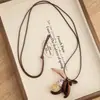 Nuevo Collar con Colgante Irregular Geométrico Estilo Chino y Borla para Mujer, Gama Alta, Personalizado, Versátil, Cadena para Suéter con Cordón de Cuero para Colgar en el Cuello