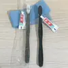 Suministros de hotel cepillo de dientes artículos de tocador desechables pasta de dientes traje empaque independiente aparato dental 2 en 1 venta al por mayor