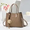 Bolso de mano para mujer de venta caliente, de alta gama, gran capacidad, casual, moderno, bandolera versátil para todas las estaciones