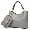 26 anos Conjunto de duas peças coreano europeu elegante padrão de crocodilo bolsa feminina de um ombro essencial para sair bolsa tote feminina