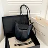 Moda Diseño de Nicho 2026 Nuevo Bolso Cubo para Mujer, Retro Simple de Alto Valor Color Sólido Personalizado Bolso de Hombro para Dama