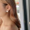Pendientes de plata S925 con forma de corazón de melocotón brillante y diseño de nicho femenino, con diseño transfronterizo europeo y americano.