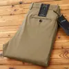 Pantalones largos de algodón de Xinjiang rectos, holgados y elásticos para negocios de otoño e invierno, pantalones casuales de sarga de algodón de alta gama para hombre