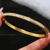 Pulsera de acero inoxidable dorada transfronteriza, traje de pulsera de trébol de cintura pequeña con tachuelas, brazaletes dorados