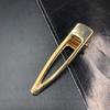 Nuevo accesorio para el cabello estilo coreano vintage sencillo que combina con todo, pinza de pico de pato de una palabra, pinza para el cabello de metal cepillado de estilo frío para celebridades de Internet.