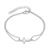 Pulsera de acero de titanio estilo ins japonés y coreano para mujer, lujo ligero, moda, retro, cruz, doble capa, plegable, adornos para la mano, venta al por mayor