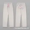 Sudadera con capucha de forro polar y espuma estilo Synaworld American Drill High Street Hip-Hop Pantalones Deportivos de Moda para Hombre