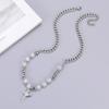 Collar de mujer de acero de titanio de alta calidad de nicho europeo y americano, cadena de clavícula cruzada con grietas de hielo y piedra de metal irregular, joyería para hombres