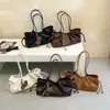 Bolso de hombro retro de nicho de lujo en piel suave para mujer, gran capacidad, perfecto para salidas de otoño y para ir al trabajo, estilo baguette bajo el brazo