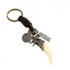Colgante Creativo y Personalizado de Diente de Lobo de Resina Llavero Decorativo Encanto de Bolso Tejido de Cuero de Estilo Étnico Simple Hecho a Mano