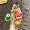 Llavero de elfo recogiendo flores de dibujos animados creativo muñeca de niña linda colgante para mochila de estudiante pequeño regalo al por mayor