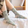 Calcetines de mujer otoño e invierno nuevos ins versátiles celebridad de internet alto valor estilo corte retro con relieve transpirables de cintura alta largos