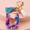 Llavero con 26 letras en inglés, estilo europeo y americano, con borlas de cristal acrílico transparente, adorno para bolso, pequeño regalo.