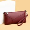 Bolsa Feminina 2026 Novo Estilo Patchwork Moda Estilo Mãe de Meia-Idade Bolsa Pequena para Celular e Moedas Versátil Simples Transversal