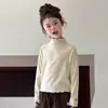 Camiseta Niña Elefante Tutú 2026 Otoño/Invierno Nueva Color Sólido Bordes Volantes Camiseta Básica Top Cuello Alto Padre-Hijo