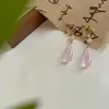 Saia de cavalo super fada gancho de orelha novo estilo chinês brincos de gota d'água pingente de calcedônia brincos longos de jade estilo retro elegante